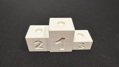 Finish podium: Proudly display your winning marbles!