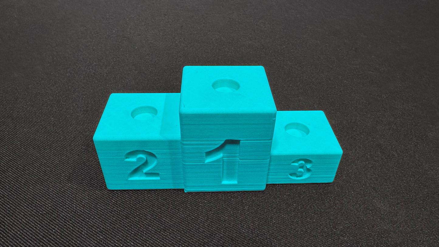 Finish podium: Proudly display your winning marbles!