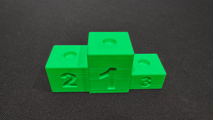 Finish podium: Proudly display your winning marbles!